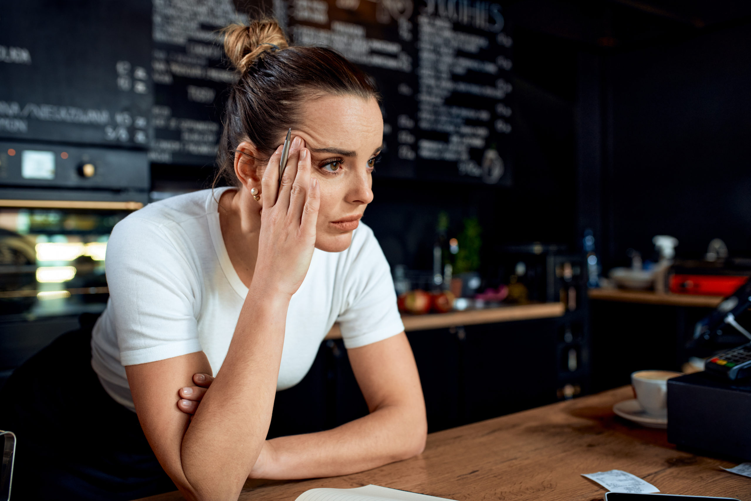 Unhappy restaurant worker symbolizing importance of employee retention
