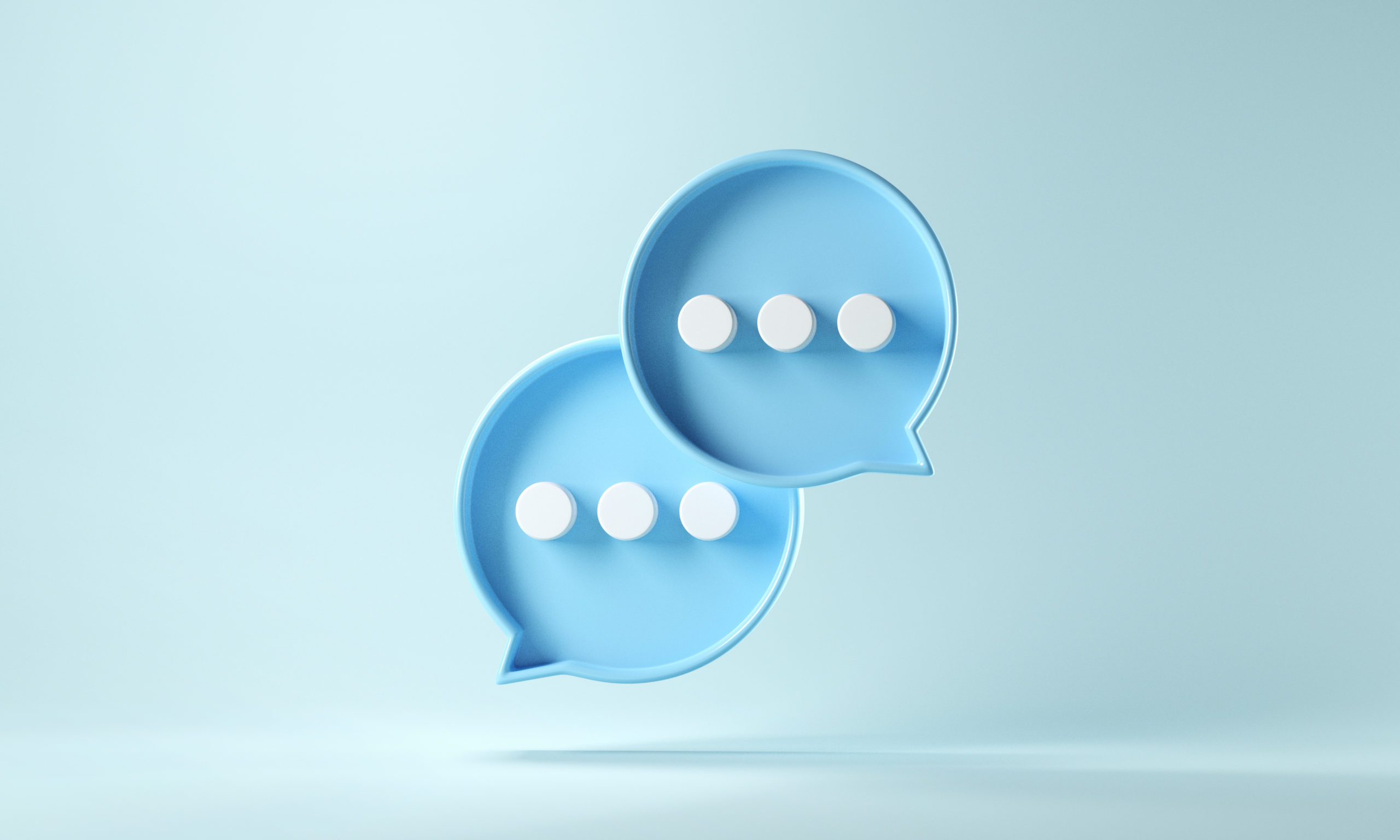 Bubble icons symbolizing communication between employees and managers
