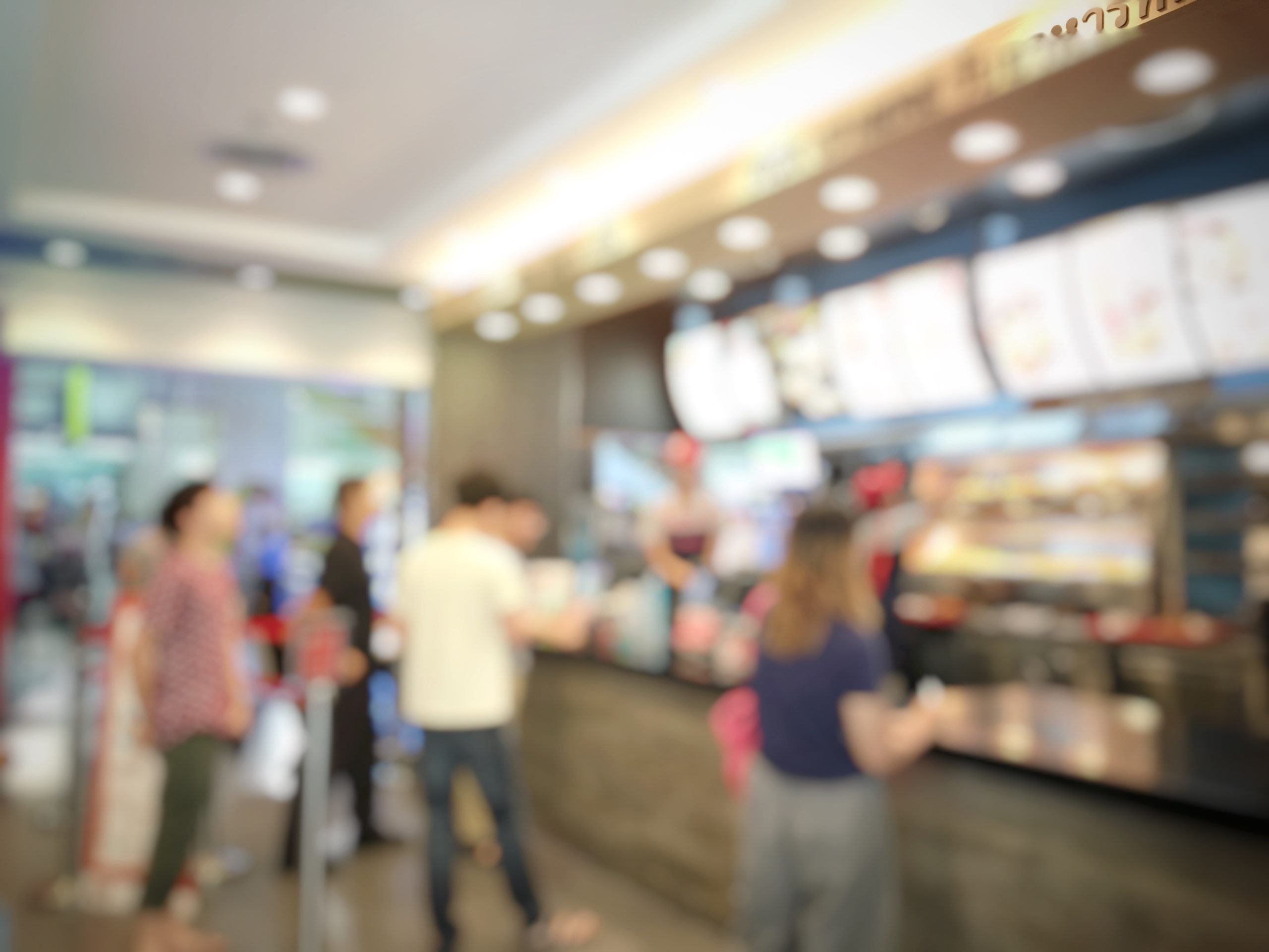 Blurry picture of the interior of a fast food restaurant 